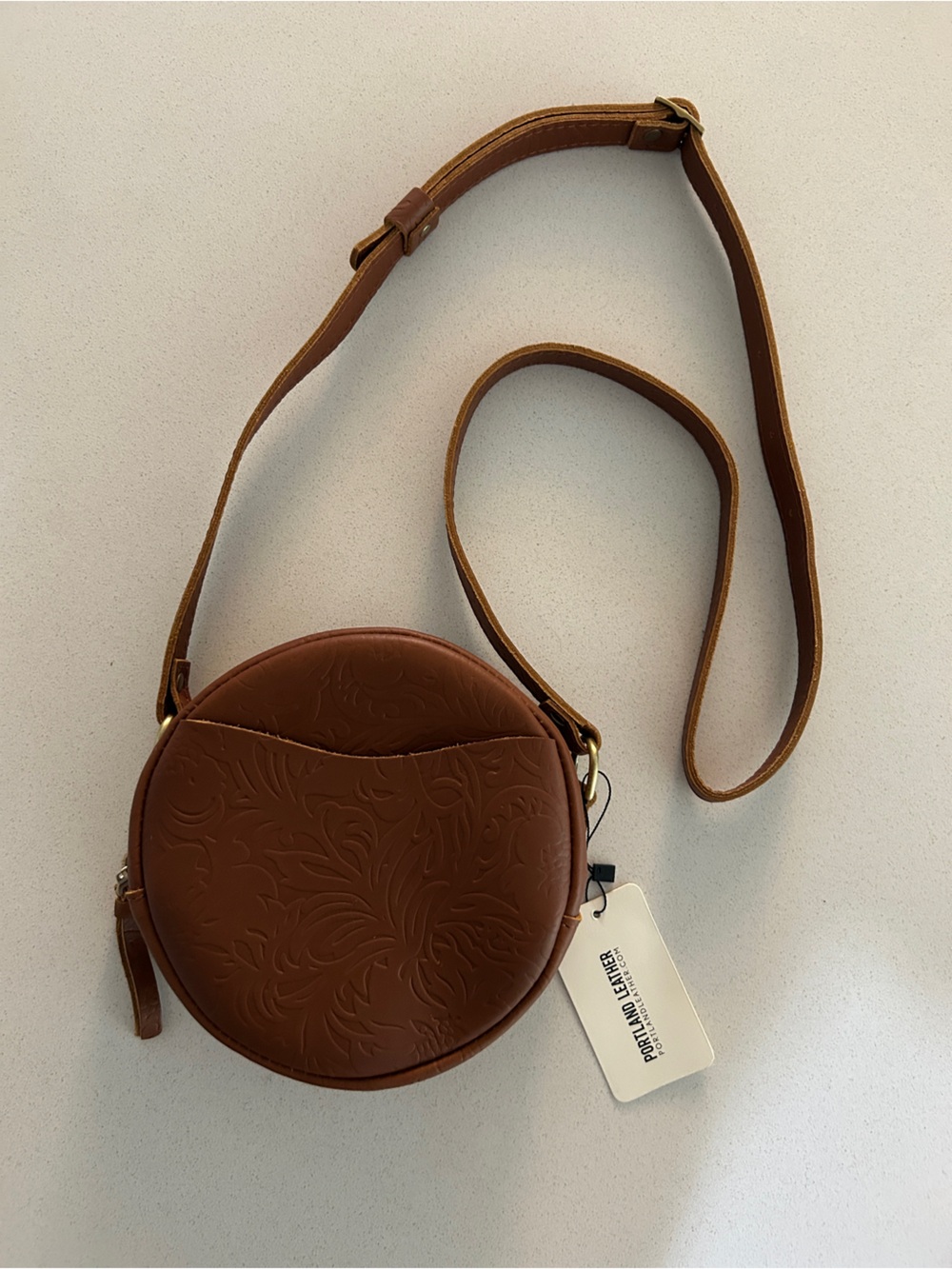 Portland Leather Tan Embossed Round Crossbody Bag